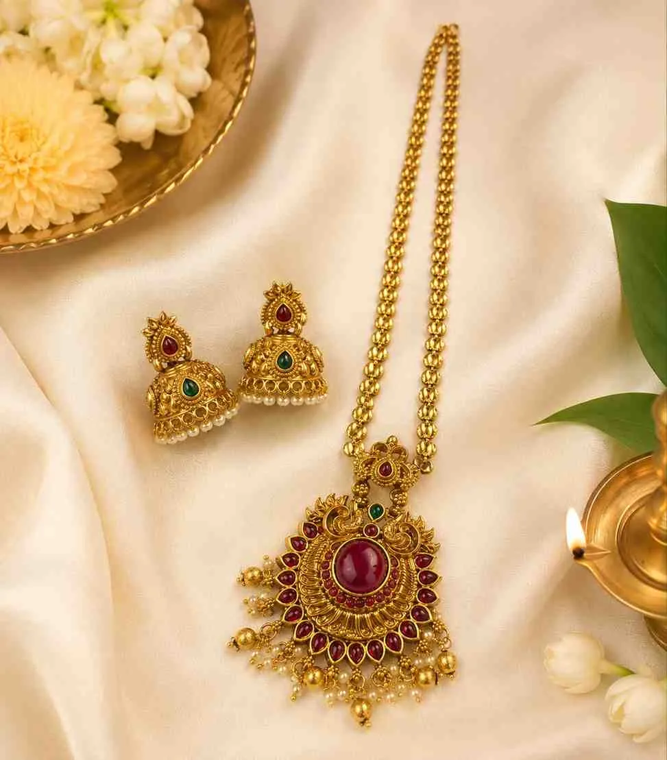 6630 Traditional Antique Gold Temple Jewellery Set with Long Haram Necklace, Jhumka Earrings, Ruby & Emerald Stones, and Guttapusalu Jhumka