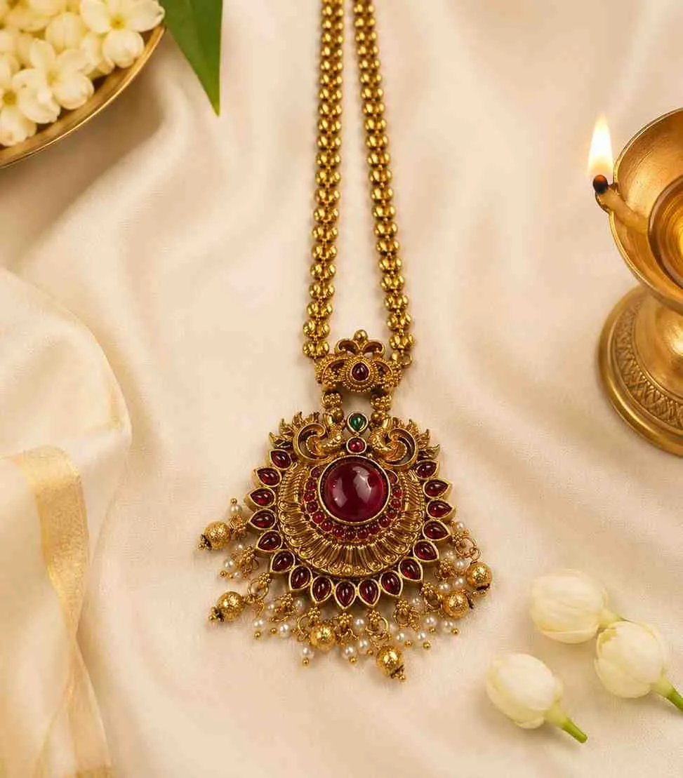 6630 Traditional Antique Gold Temple Jewellery Set with Long Haram Necklace, Jhumka Earrings, Ruby & Emerald Stones, and Guttapusalu Jhumka