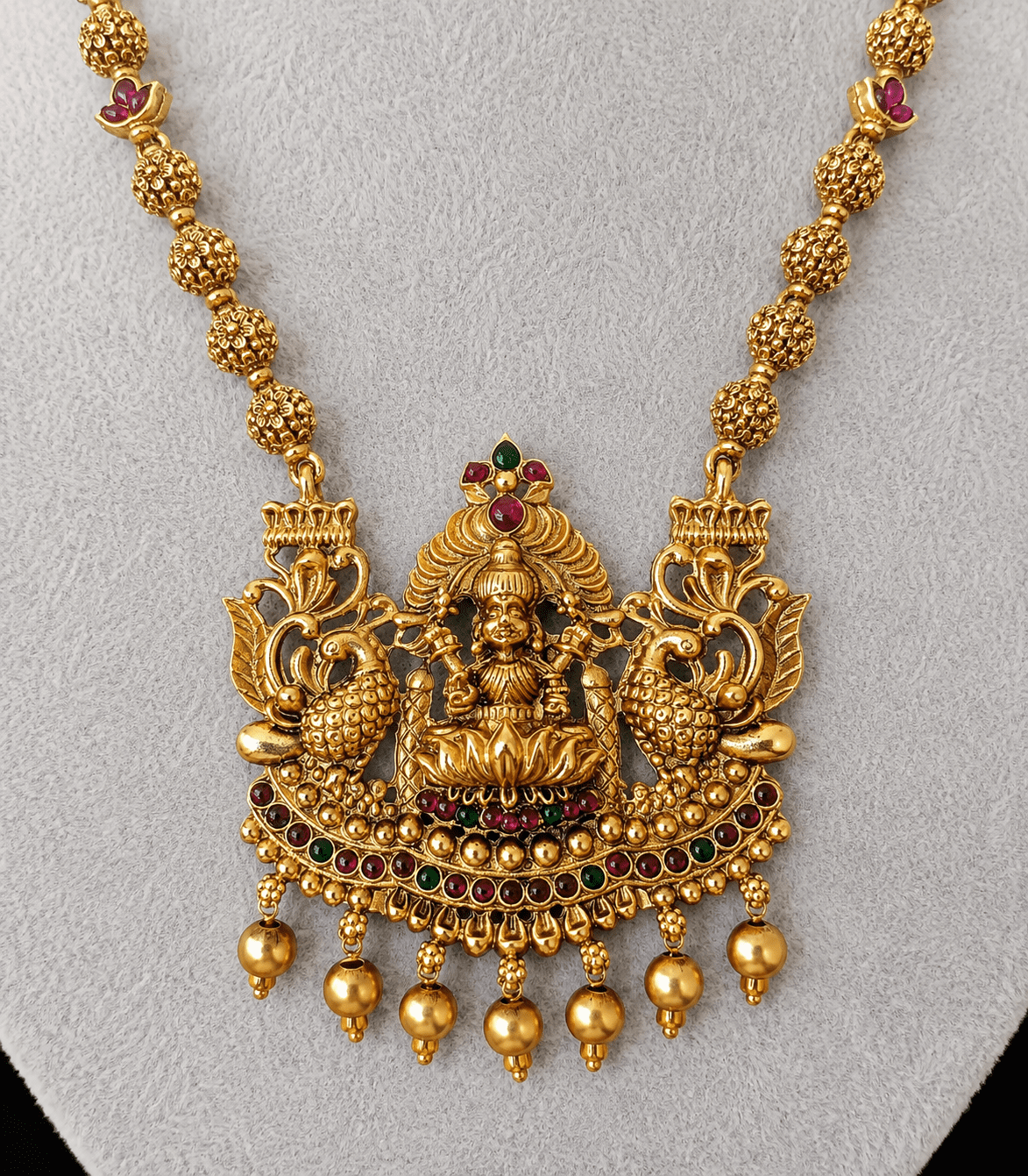 6616-long-temple-flat-pendant-with-devi-and-peacock