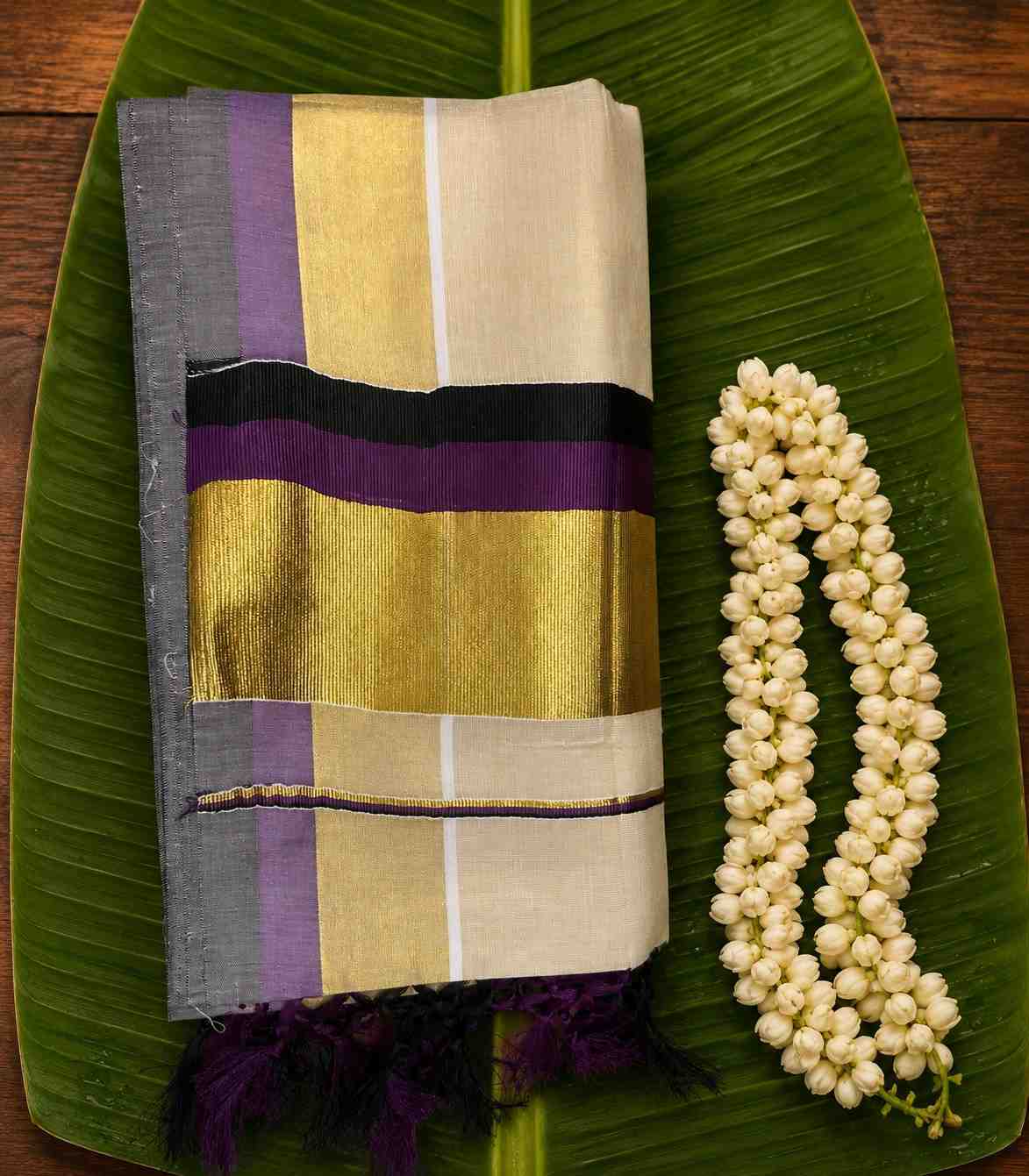 2254 Onam Special Collection Kerala Tissue Kattikkara Double Color Kasavu Saree in Purple and Black Border and Tussels
