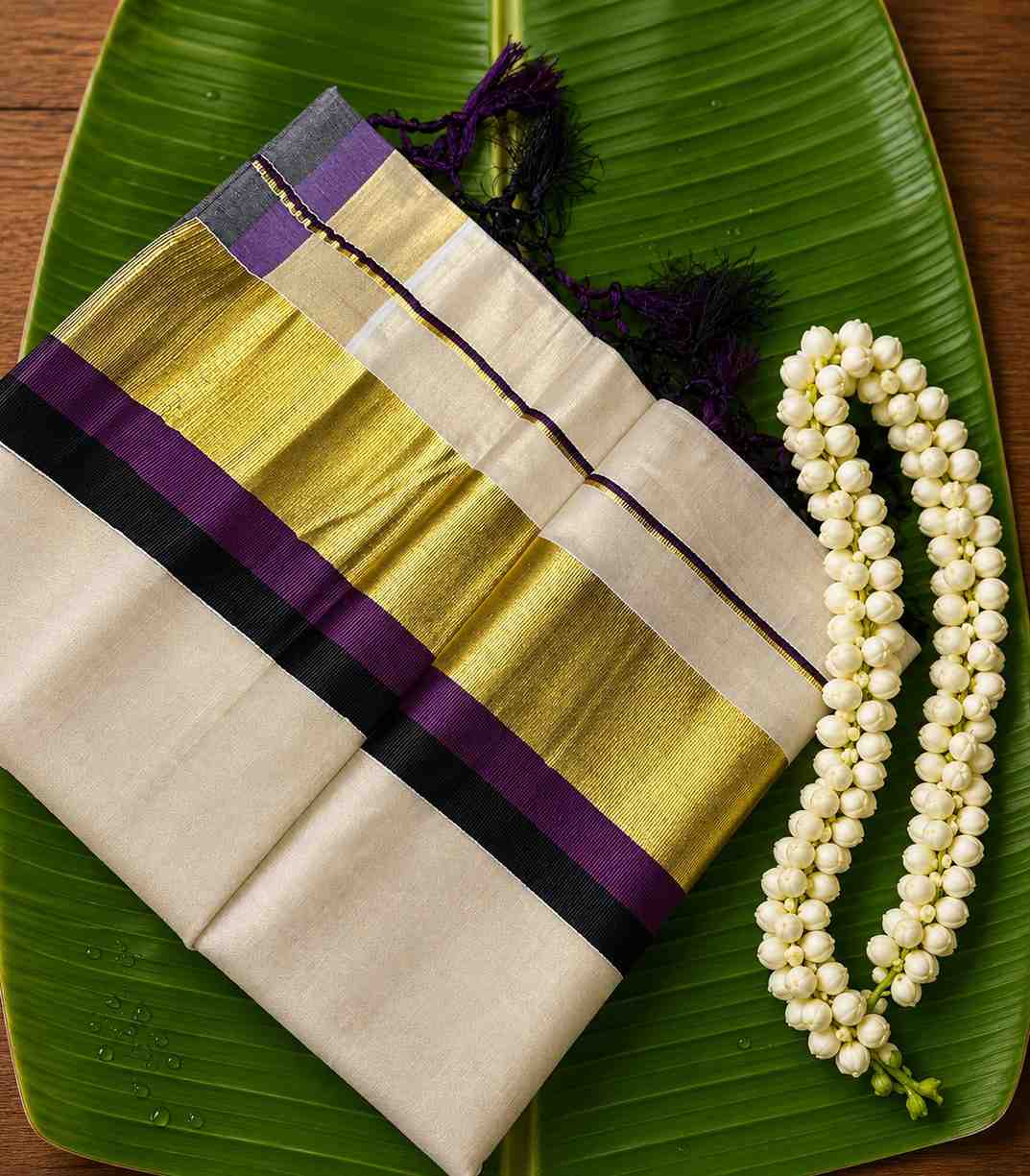 2254 Onam Special Collection Kerala Tissue Kattikkara Double Color Kasavu Saree in Purple and Black Border and Tussels