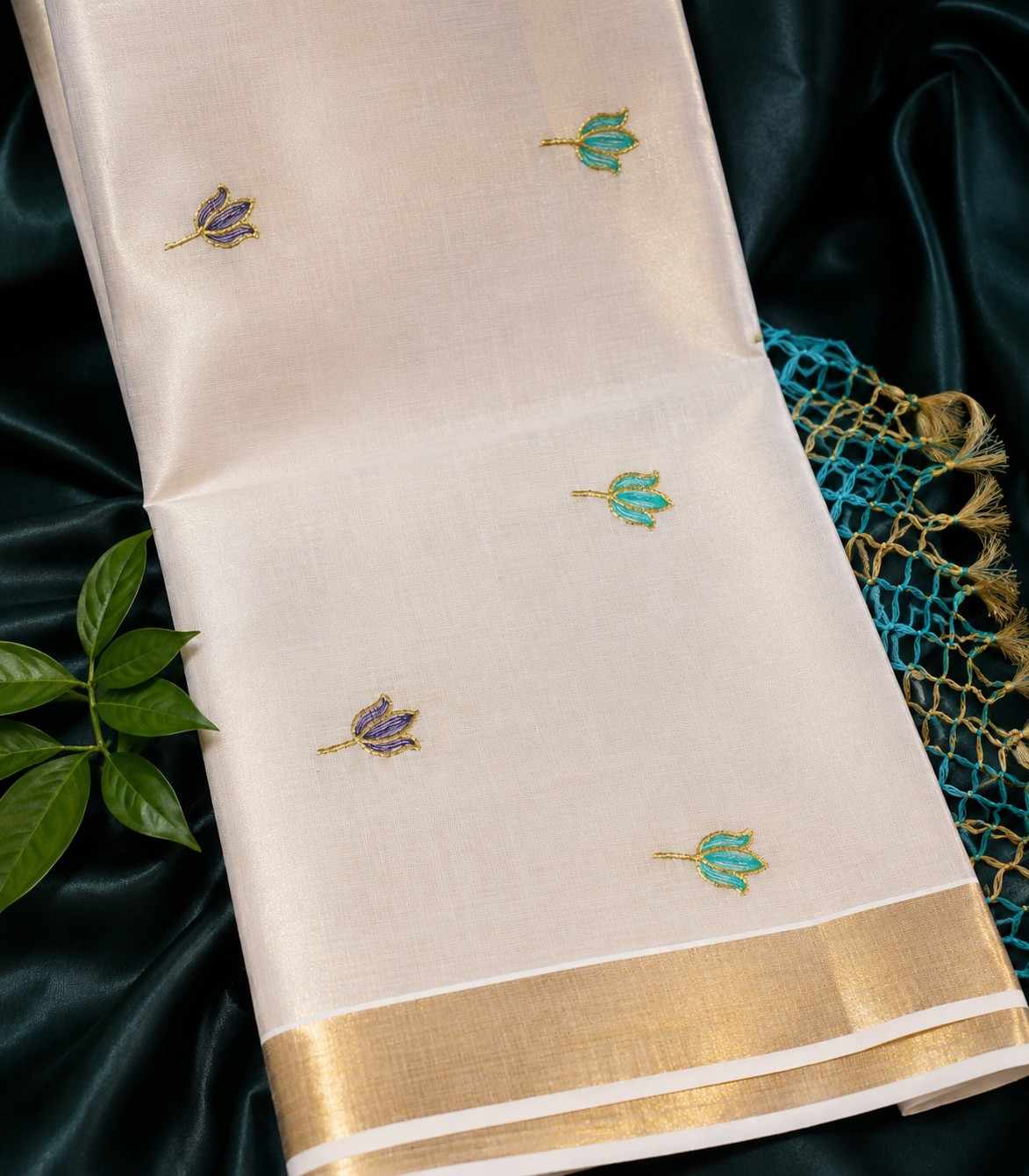 2263-kerala-tissue-kasavu-saree-in-embroidered-purple-and-blue-lotus-motifs