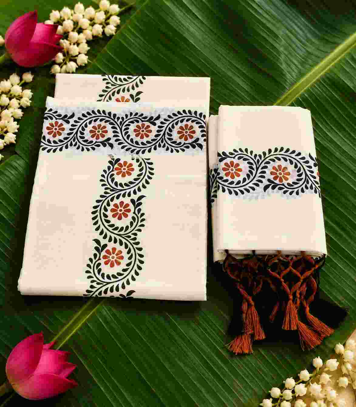 2287-kerala-set-mundu-in-hand-block-floral-print-black-orange-with-tassels