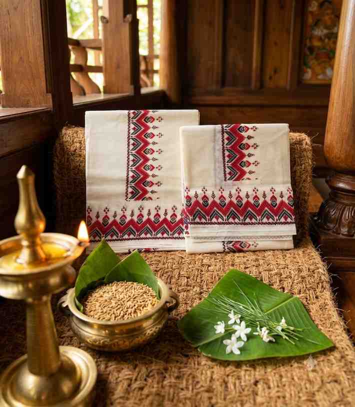 2299 Kerala Set Mundu with Red and Black Tribal Temple Motif Border