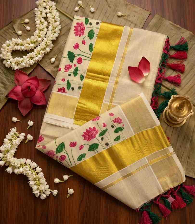 2333 Onam Special Collection Kerala Tissue Lotus Color Floral Block Print and Golden Zari Border with Tussels